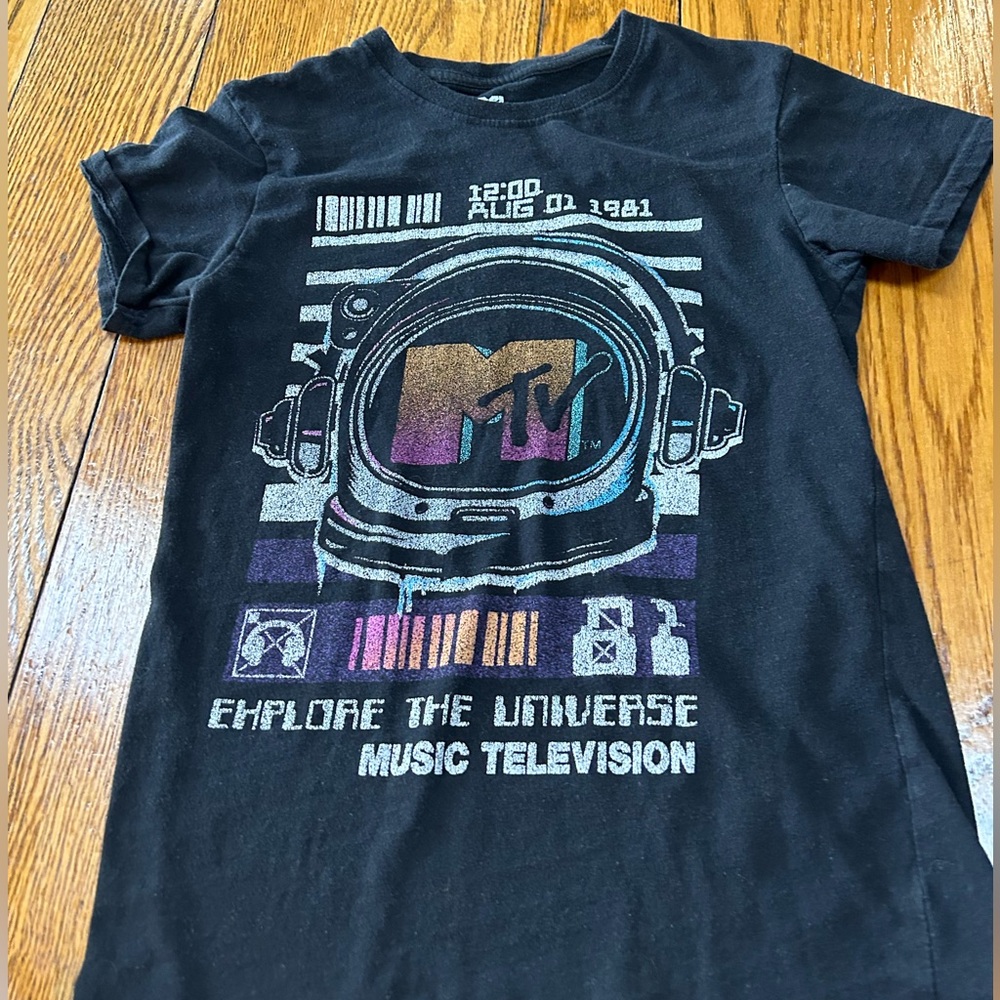 M/TV 80’s black short sleeve tee shirt.  Astronaut helmet Music Television logo.